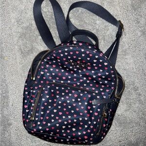 Kate Spade Backpack  9.5” tall x 10” wide x 5” opening